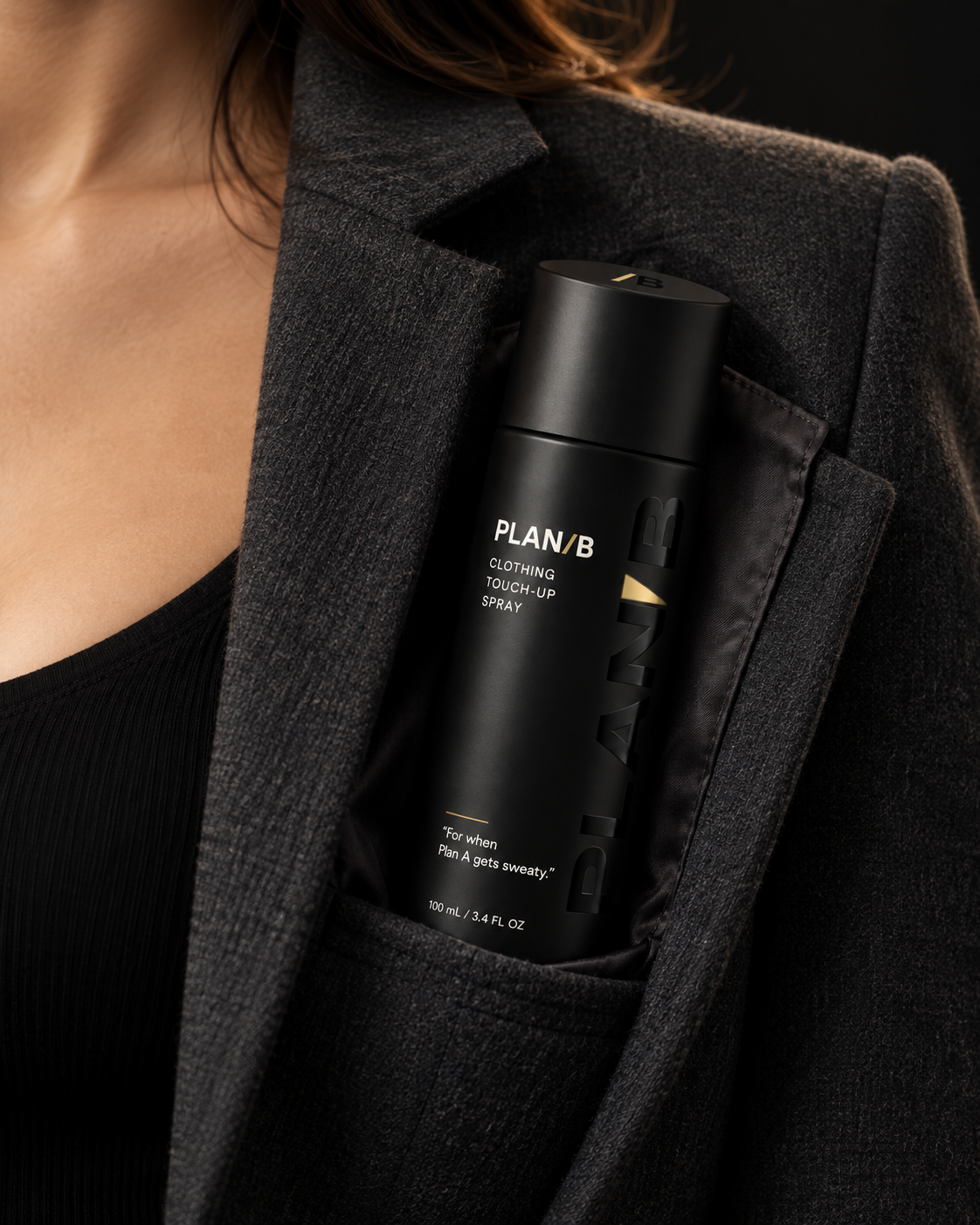 Plan B in the inside pocket of a charcoal blazer